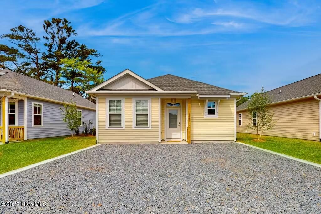 Photo of 121 NE 75th Street, Oak Island, NC 28465 (MLS # 100559345)