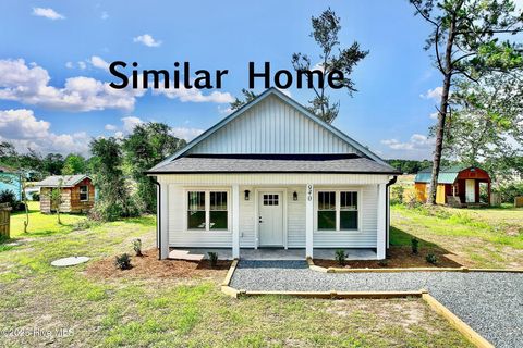 Photo of 949 Lower County Street SW, Calabash, NC 28467 (MLS # 100544478)