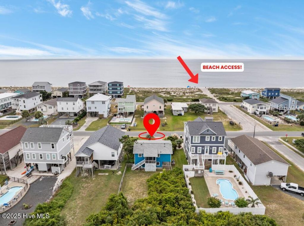 Photo of 2906 E Dolphin Drive, Oak Island, NC 28465 (MLS # 100531586)