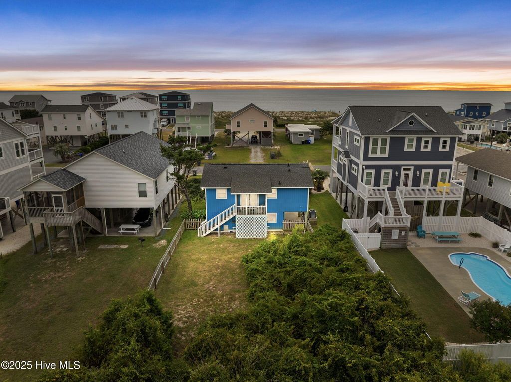 Photo of 2906 E Dolphin Drive, Oak Island, NC 28465 (MLS # 100531586)