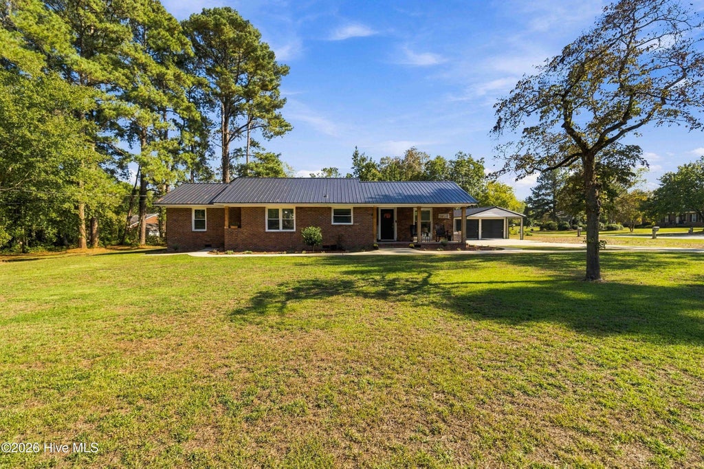 Photo of 4602 Lake Wilson Road, Elm City, NC 27822 (MLS # 100610390)