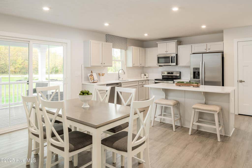 Photo of 3341 Primrose Drive, Navassa, NC 28451 (MLS # 100595619)