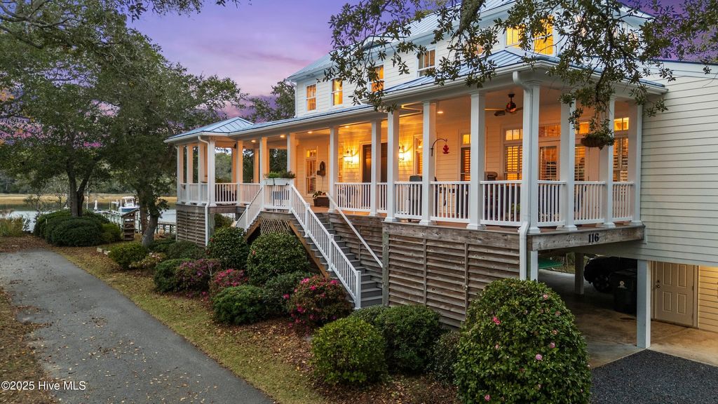 Photo of 116 SW Yacht Drive, Oak Island, NC 28465 (MLS # 100544140)