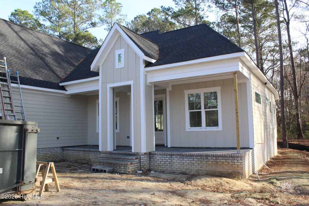Photo of 627 Ashbury Drive SE, Bolivia, NC 28422 (MLS # 100536128)