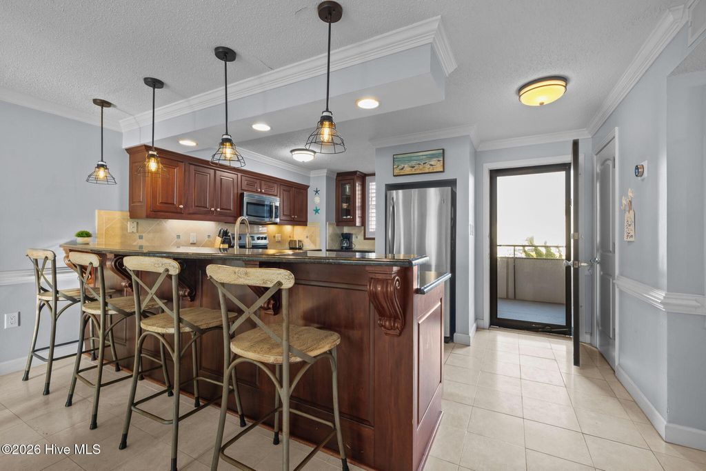 Photo of 1505 Salter Path Road #228, Indian Beach, NC 28512 (MLS # 100571697)