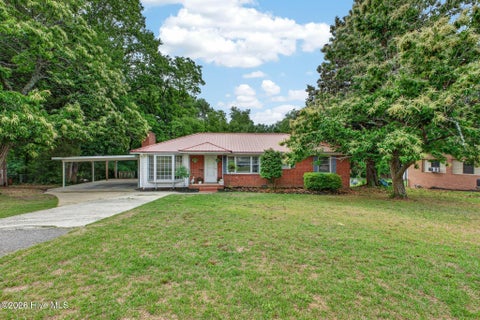 Photo of 411 Forest Circle, New Ellenton, SC 29809 (MLS # 100574599)
