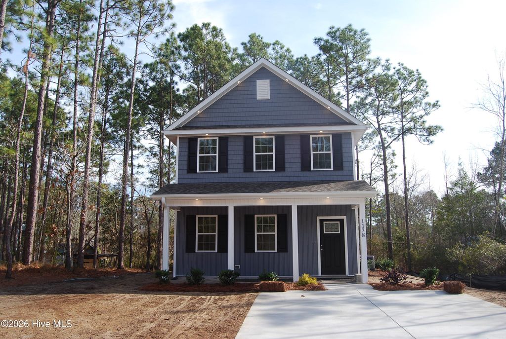 Photo of 1202 Grace Road, Southport, NC 28461 (MLS # 100575312)