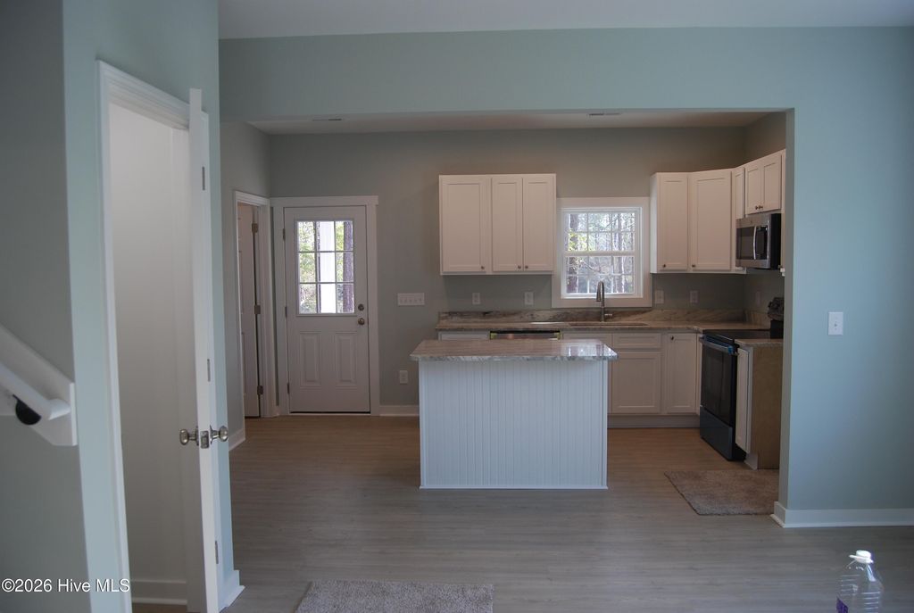 Photo of 1202 Grace Road, Southport, NC 28461 (MLS # 100575312)