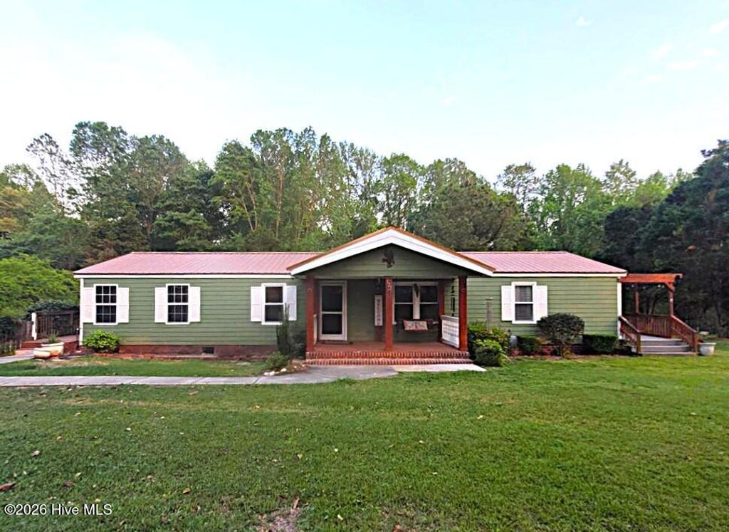 Photo of 121 Plantation Drive, Warsaw, NC 28398 (MLS # 100561899)