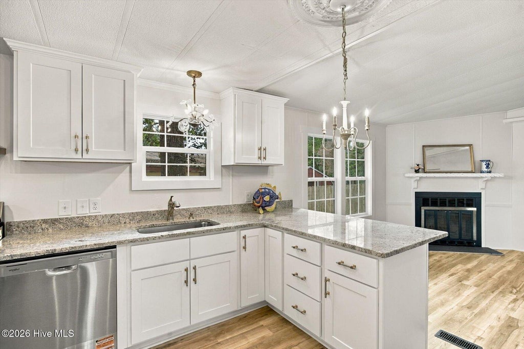 Photo of 621 Harbor Drive SE, Bolivia, NC 28422 (MLS # 100602968)