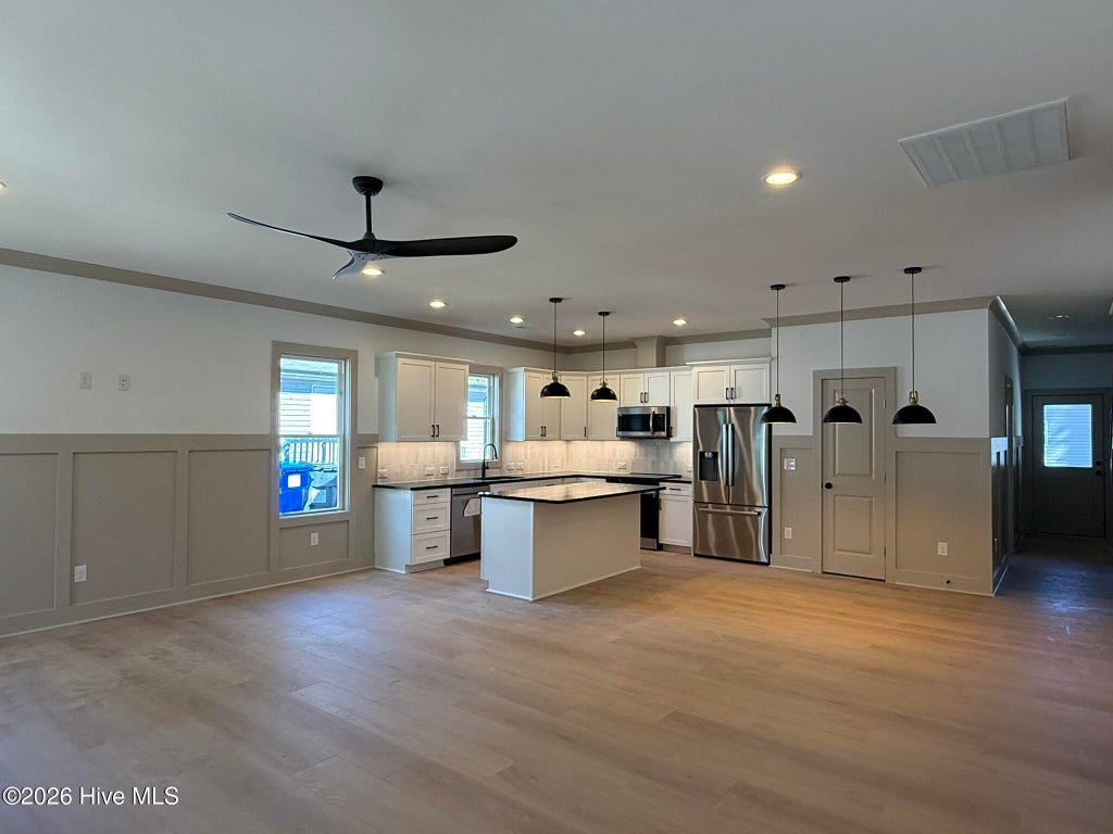 Photo of 254 NE 66th Street, Oak Island, NC 28465 (MLS # 100594361)
