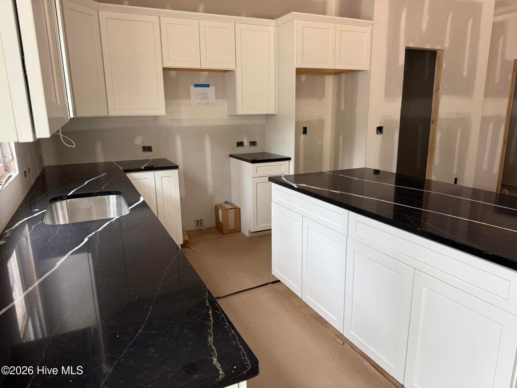 Photo of 254 NE 66th Street, Oak Island, NC 28465 (MLS # 100594361)