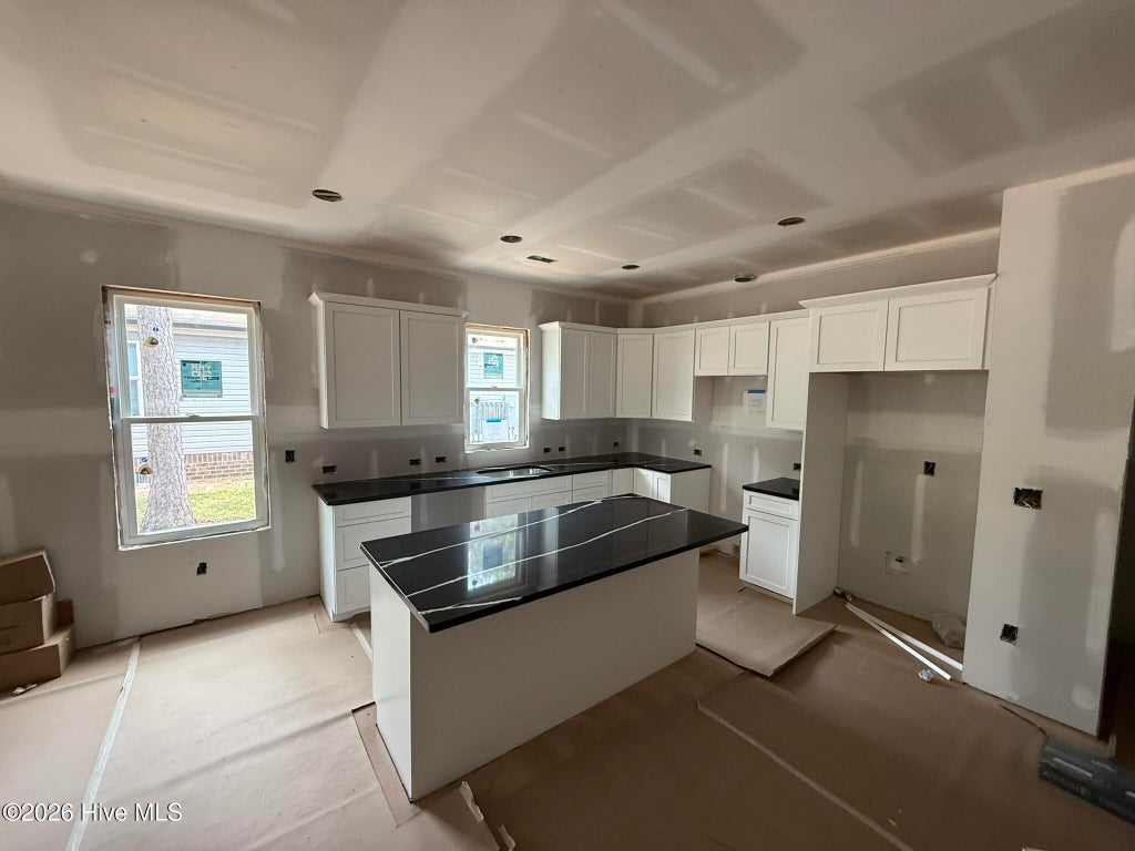 Photo of 254 NE 66th Street, Oak Island, NC 28465 (MLS # 100594361)