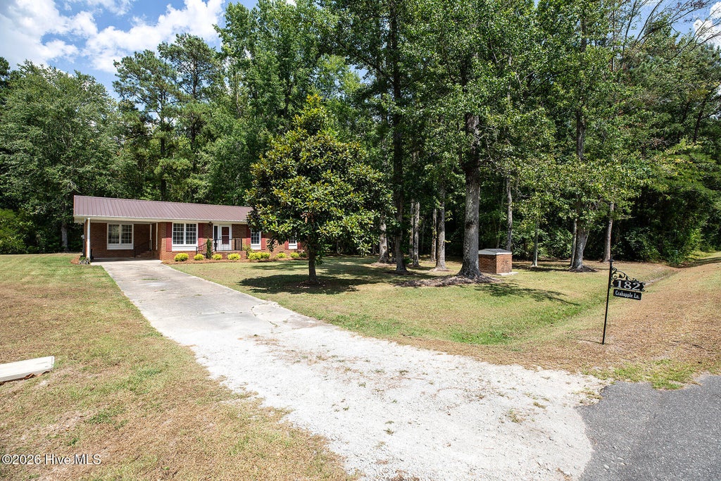 Photo of 182 Crabapple Lane, Lake Waccamaw, NC 28450 (MLS # 100589014)
