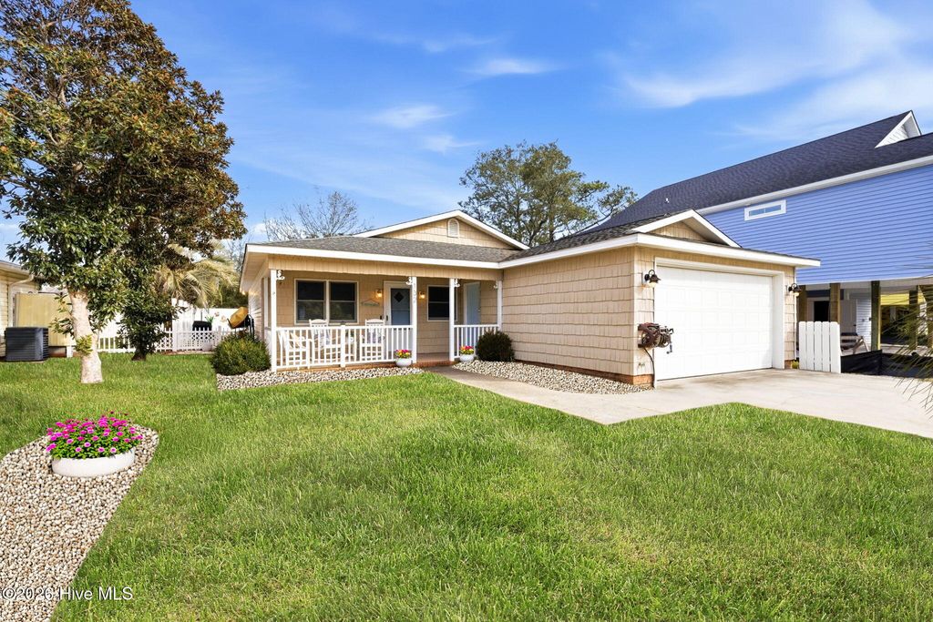 Photo of 132 NE 32nd Street, Oak Island, NC 28465 (MLS # 100560185)
