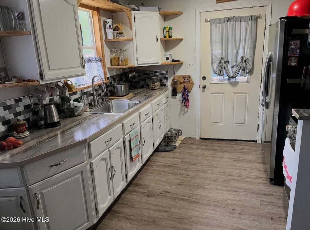 Photo of 206 Community Road, Eagle Springs, NC 27242 (MLS # 100595165)