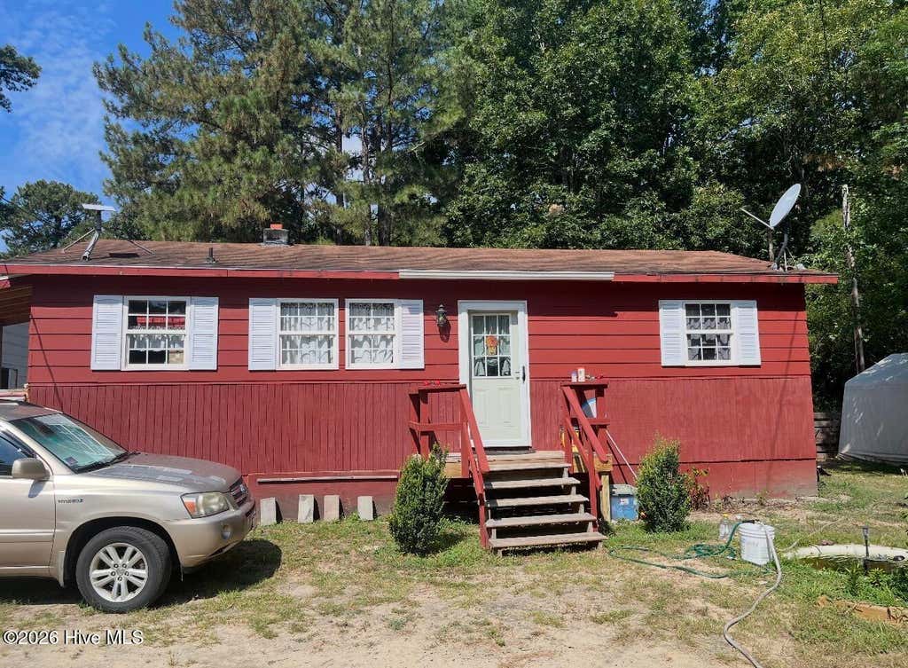 Photo of 206 Community Road, Eagle Springs, NC 27242 (MLS # 100595165)