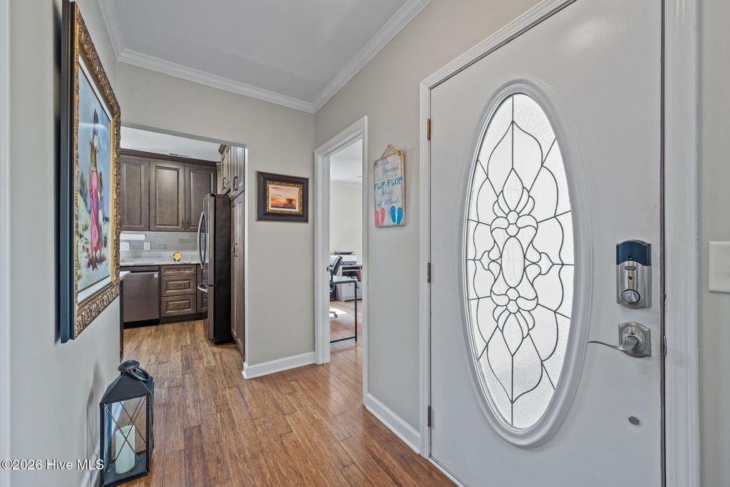 Photo of 229 Doral Drive, Hampstead, NC 28443 (MLS # 100563854)