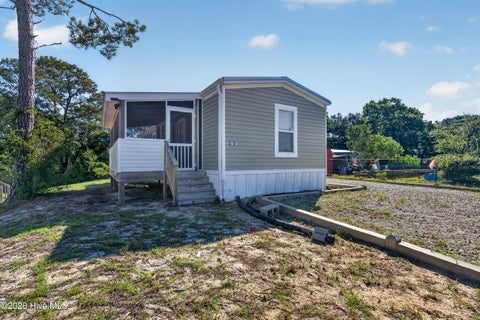 Photo of 2414 Shoreline Drive SW, Supply, NC 28462 (MLS # 100611606)