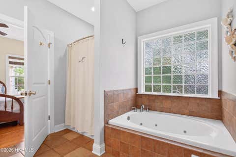 Tiny photo for 306 NE 46th Street, Oak Island, NC 28465 (MLS # 100579582)