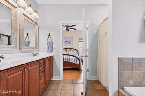 Tiny photo for 306 NE 46th Street, Oak Island, NC 28465 (MLS # 100579582)