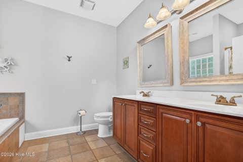 Tiny photo for 306 NE 46th Street, Oak Island, NC 28465 (MLS # 100579582)