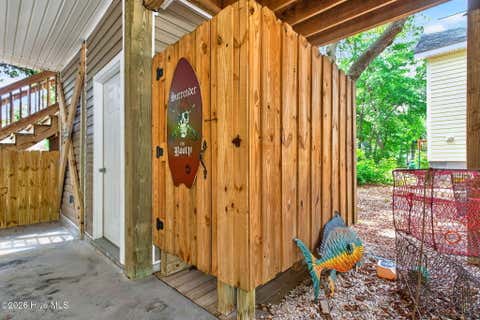 Tiny photo for 306 NE 46th Street, Oak Island, NC 28465 (MLS # 100579582)