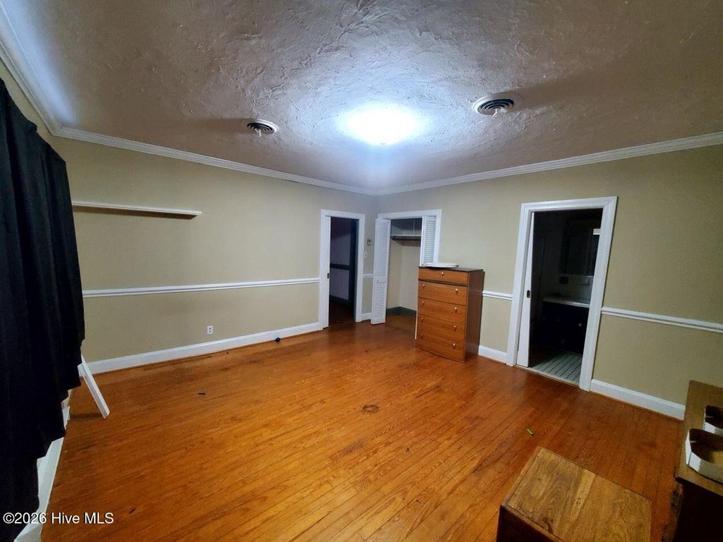 Photo of 303 W Pippen Street, Whitakers, NC 27891 (MLS # 100557457)