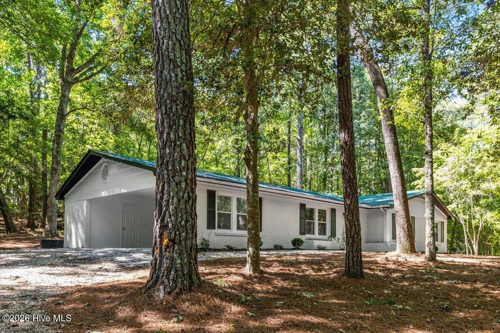 Photo of 115 Wood River Road, West End, NC 27376 (MLS # 100603260)
