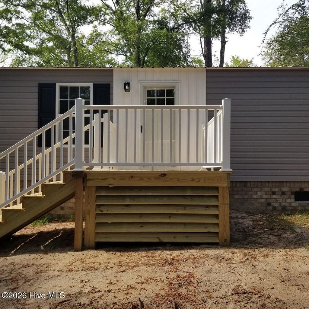 Photo of 232 Lake Drive SW, Supply, NC 28462 (MLS # 100572601)