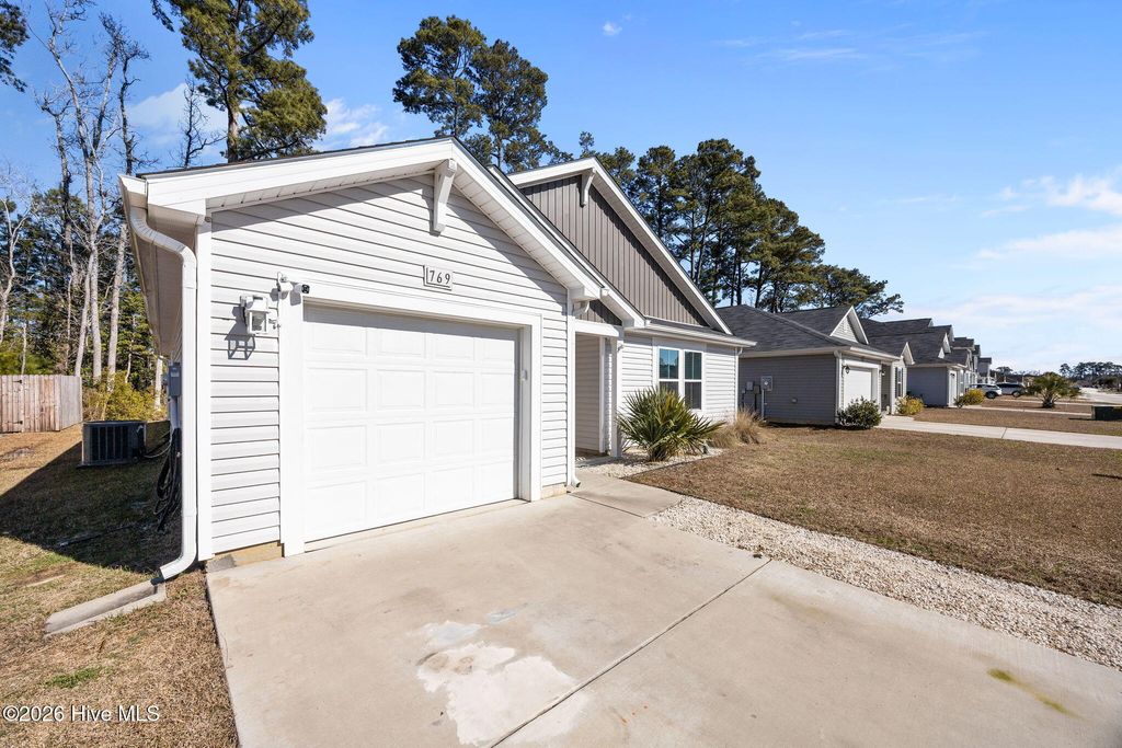 Photo of 769 Landmark Cove, Carolina Shores, NC 28467 (MLS # 100551774)