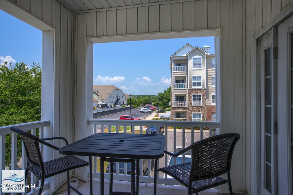 Photo of 300 Gateway Condos Drive #320, Surf City, NC 28445 (MLS # 100587842)