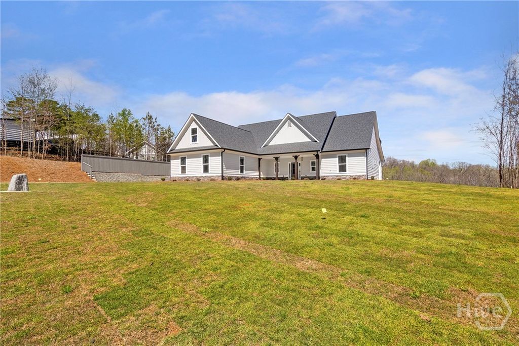 Photo of 647 Fairview Road Rd, Pendergrass, GA 30567 (MLS # CL353941)