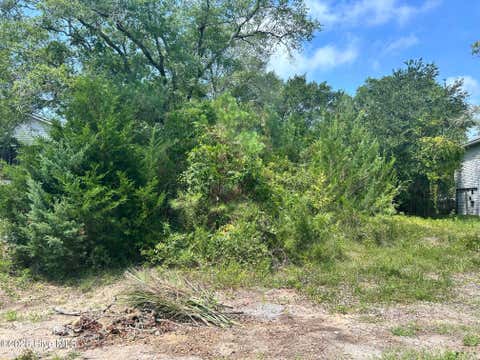 Photo of 105 SE 8th Street, Oak Island, NC 28465 (MLS # 100598080)