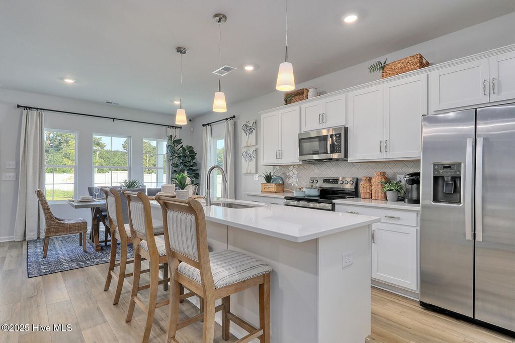 Photo of 846 Schoolfield Drive, Sneads Ferry, NC 28460 (MLS # 100564111)