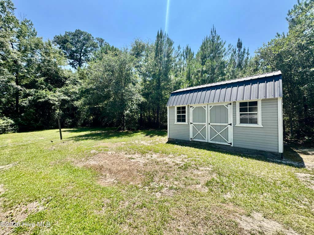 Photo of 136 Floyd Pond Lane, Richlands, NC 28574 (MLS # 100592266)