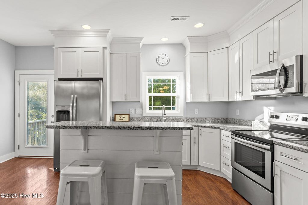 Photo of 103 NE 18th Street, Oak Island, NC 28465 (MLS # 100545093)