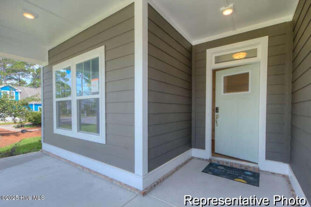 Photo of 390 Lamer Loop #101, Shallotte, NC 28470 (MLS # 100593647)