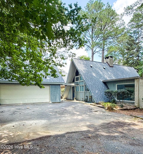 Photo of 2 Little River Lane, Whispering Pines, NC 28327 (MLS # 100586808)