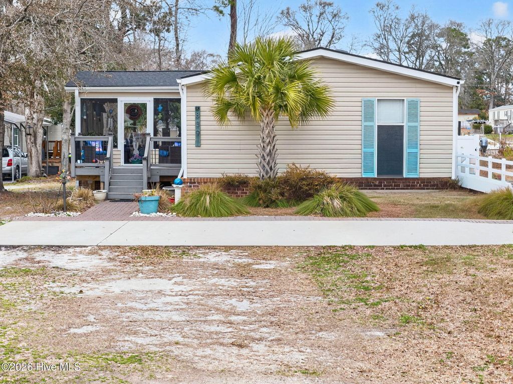 Photo of 839 Magnolia Drive, Sunset Beach, NC 28468 (MLS # 100557297)