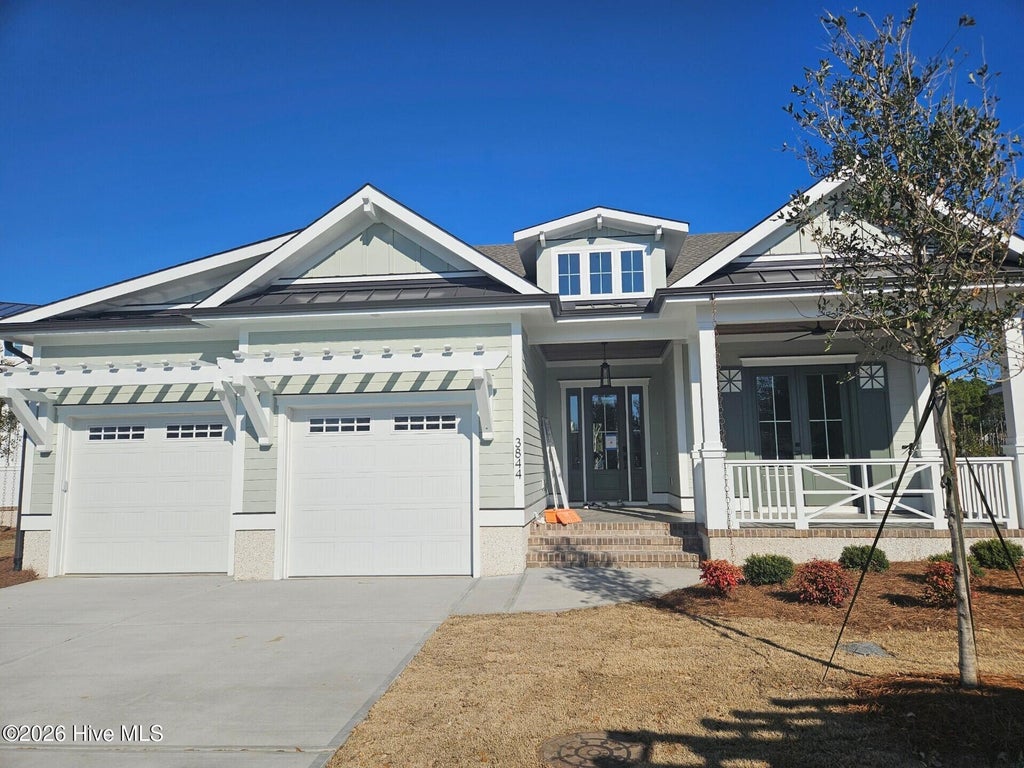 Photo of 3836 Reserve Club Drive, Southport, NC 28461 (MLS # 100587013)