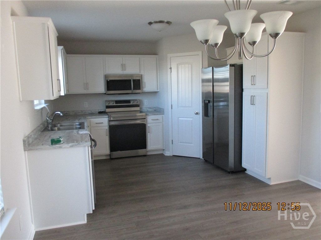 Photo of 41 Sunflower Circle NE, Ludowici, GA 31316 (MLS # SA345575)