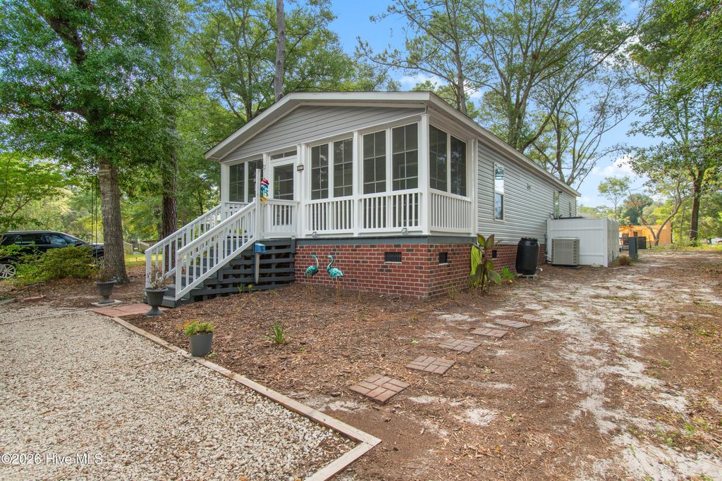 Photo of 9275 Bonaparte Drive SW, Calabash, NC 28467 (MLS # 100590870)