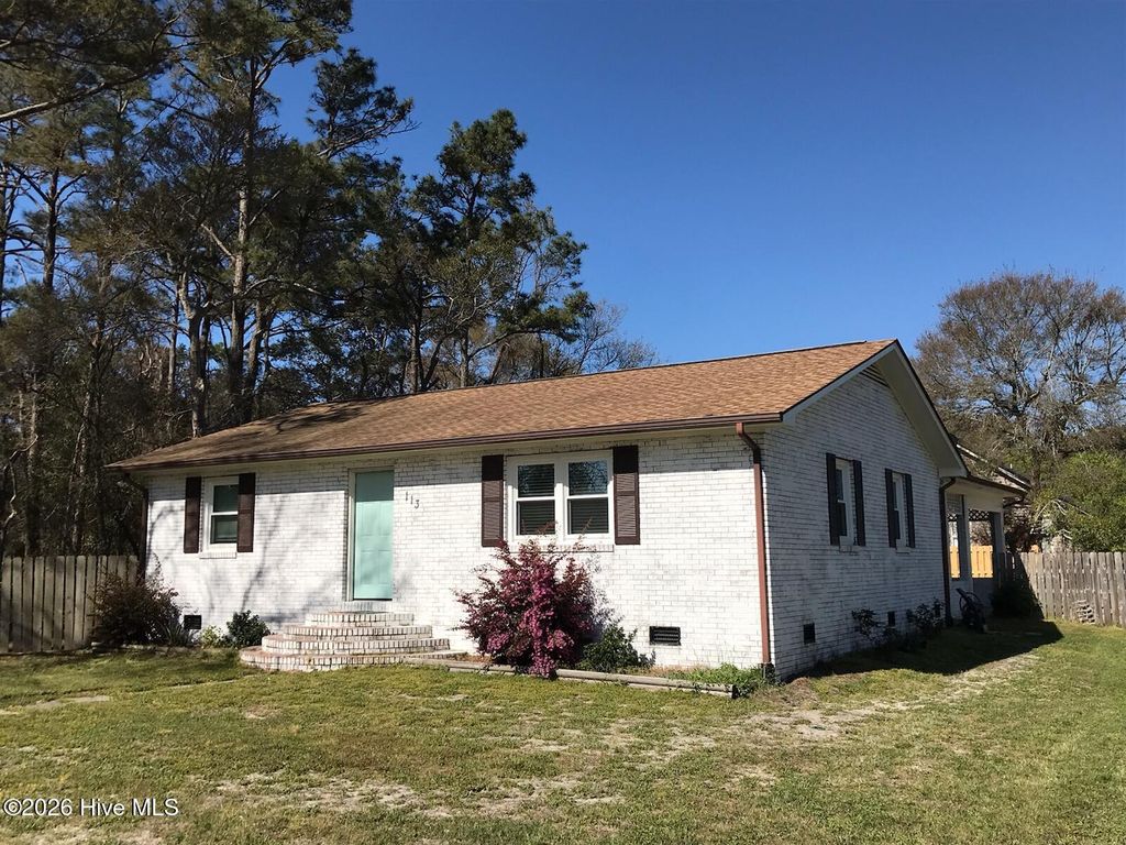 Photo of 113 NE 57th Street, Oak Island, NC 28465 (MLS # 100551214)