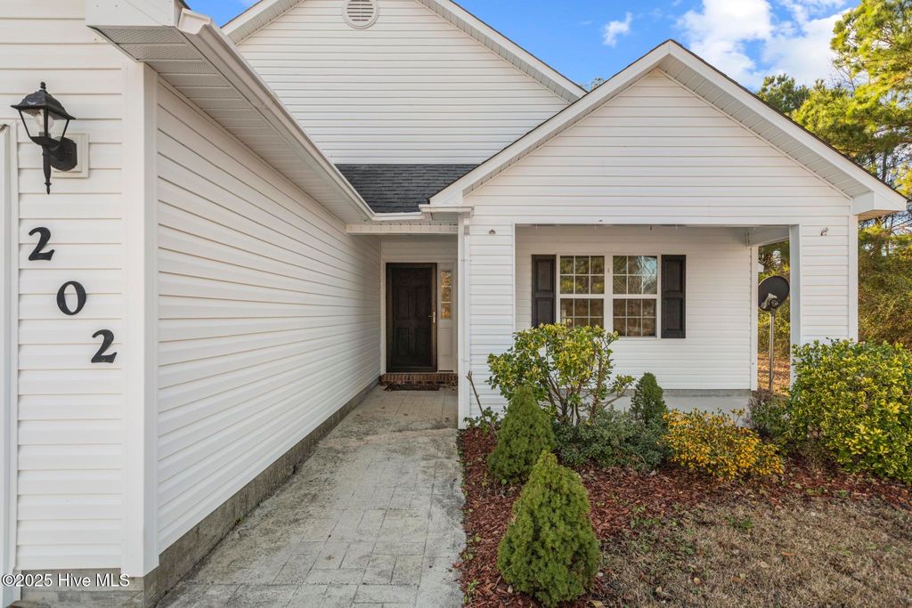 Photo of 202 Scout Lane, Chinquapin, NC 28521 (MLS # 100542040)