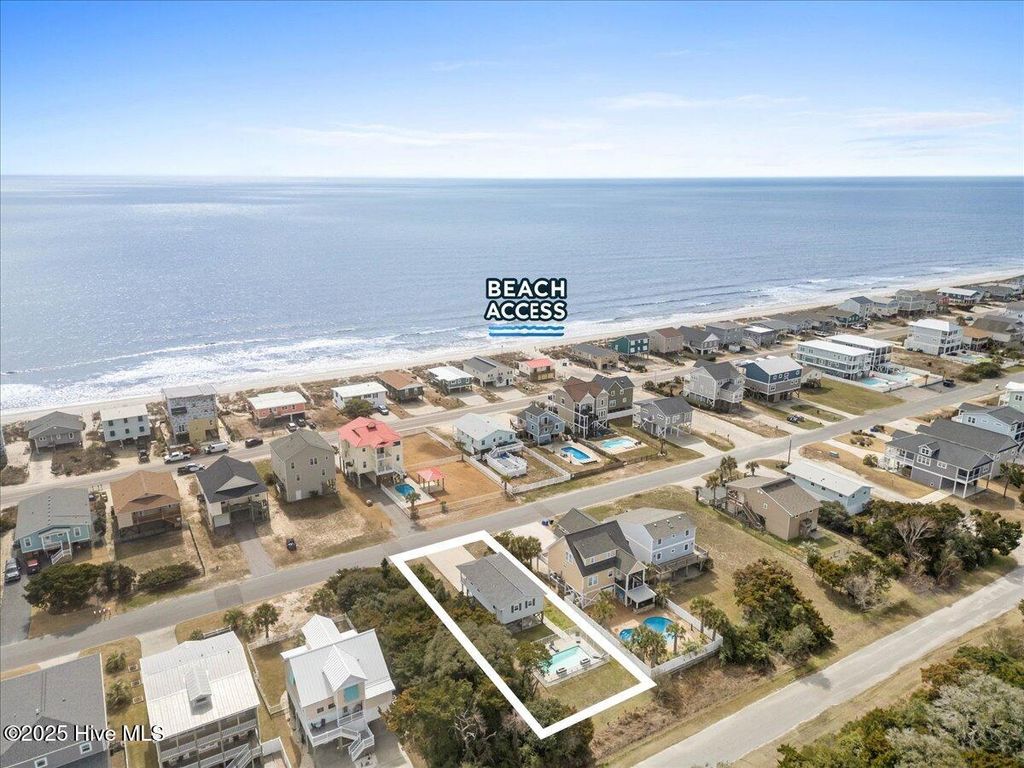 Photo of 220 W Dolphin Drive, Oak Island, NC 28465 (MLS # 100493245)