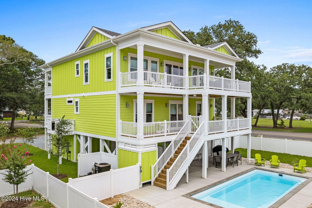 Photo of 96 SE 66th Street, Oak Island, NC 28465 (MLS # 100584830)