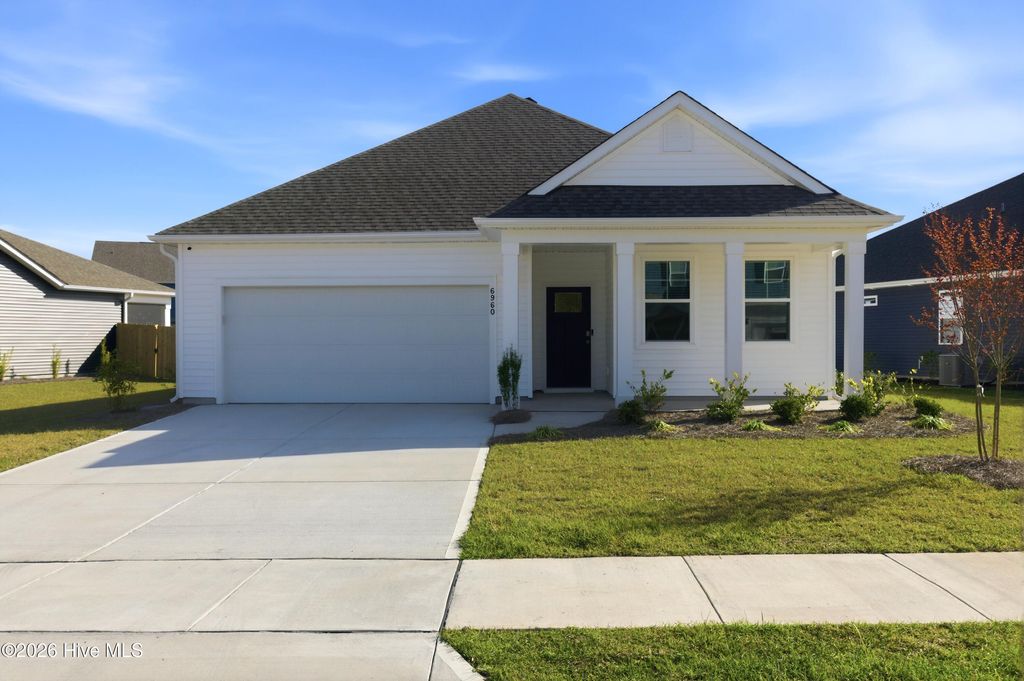 Photo of 6960 Sasparilla Drive, Leland, NC 28451 (MLS # 100563047)