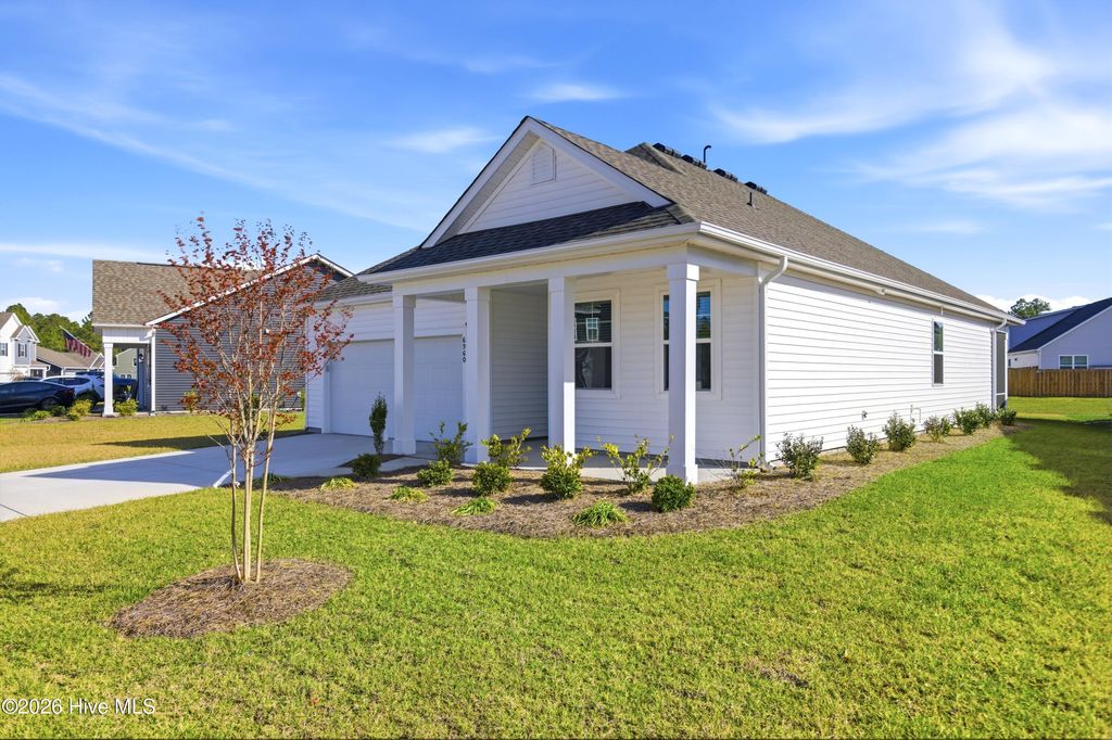 Photo of 6960 Sasparilla Drive, Leland, NC 28451 (MLS # 100563047)