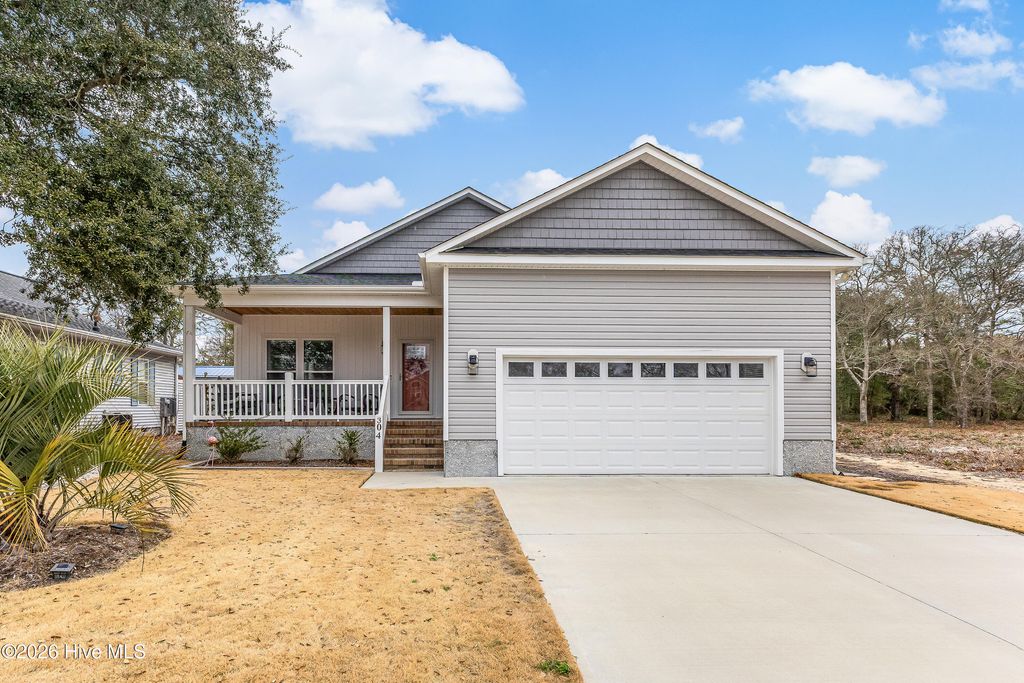 Photo of 304 E Oak Island Drive, Oak Island, NC 28465 (MLS # 100555822)